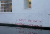 "I don't believe in global warming" in London. CC BY Matt Brown